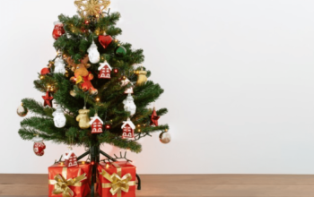 Transform Your Home into a Winter Wonderland with an Artificial Green Christmas Tree and Flocked Decorations: Delightful Ideas for Creating Lasting Memories This Holiday Season.